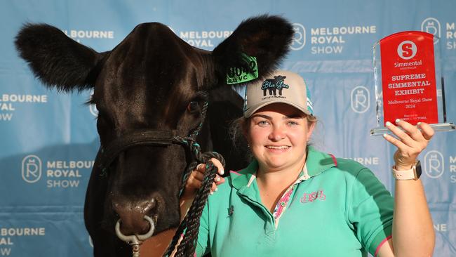 Tayla Miller with her supreme Simmental exhibit.