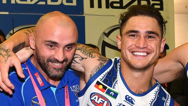 MELBOURNE, AUSTRALIA - MAY 31: Interim coach of the Kangaroos Rhyce Shaw hugs Marley Williams of the Kangaroos after winning the round 11 AFL match between the North Melbourne Kangaroos and the Richmond Tigers at Marvel Stadium on May 31, 2019 in Melbourne, Australia. (Photo by Quinn Rooney/Getty Images)