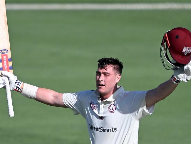 BRISBANE, AUSTRALIA - NOVEMBER 17: Matthew Renshaw of Queensland celebrates after scoring a century during the Sheffield Shield match between Queensland and Tasmania at Allan Border Field, on November 17, 2024, in Brisbane, Australia. (Photo by Bradley Kanaris/Getty Images)