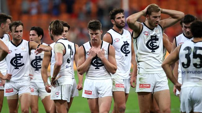 Carlton players show their disappointment after a hiding against GWS. Picture. Phil Hillyard