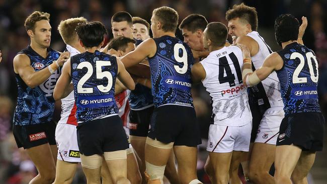 Carlton players remonstrate with Ben Long after his bump on Levi Casboult. Picture: Michael Klein.