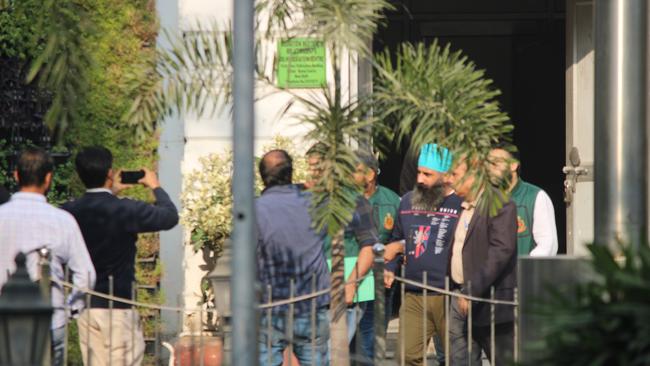 The arrest of Rajwinder Singh. Picture: Bilal Kuchay