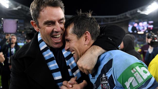 NSW Blues coach Brad Fittler celebrates with Mitchell Pearce following their win in Game 3 of the 2019 State of Origin series.