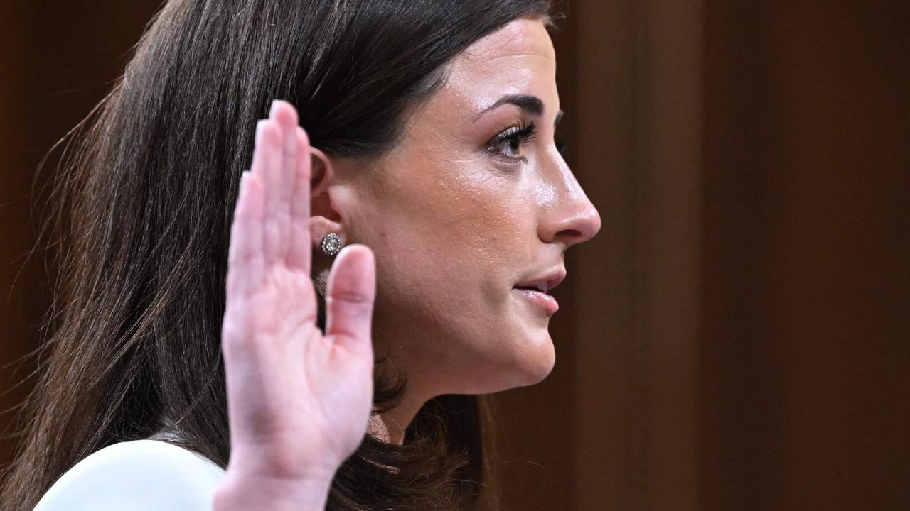 Ms Hutchinson swearing to tell the truth before her testimony. Picture: Mandel Ngan/AFP