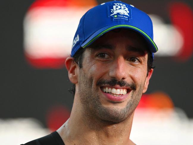 SINGAPORE, SINGAPORE - SEPTEMBER 22: 18th placed Daniel Ricciardo of Australia and Visa Cash App RB speaks to the media after the F1 Grand Prix of Singapore at Marina Bay Street Circuit on September 22, 2024 in Singapore, Singapore. (Photo by Rudy Carezzevoli/Getty Images)