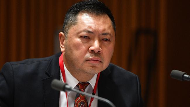 Race Discrimination Commissioner Chin Tan at a Senate estimates hearing at Parliament House in Canberra. (AAP Image/Mick Tsikas)