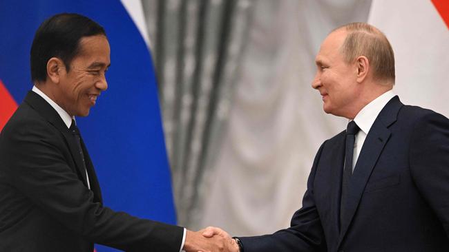 Joko Widodo and Vladimir Putin shake on it in the Kremlin on Thursday. Picture: AFP