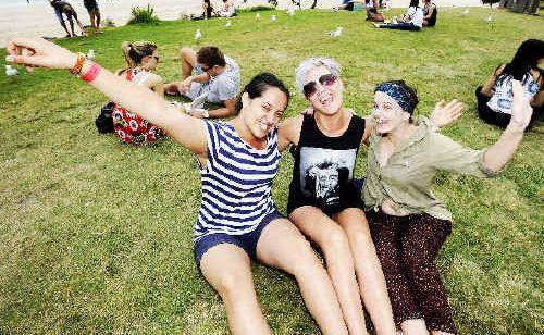 Byron Bay has enjoyed the company of a more discerning group of school leavers this year, at odds with the media hype surrounding the event. Pictured enjoying schoolies at Byron Bay this year are (from left) Sara Khan, 17, Alexis Jayne, 18, and Sarah Coffey, 18, all from Sydney. . Picture: Cathy Adams