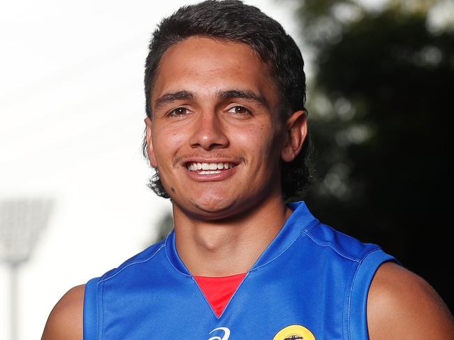 MELBOURNE, AUSTRALIA - DECEMBER 09: Jamarra Ugle-Hagan poses for a photograph in a Bulldogs jumper after being announced as the number 1 pick during the NAB AFL Draft on December 09, 2020 in Melbourne, Australia. (Photo by Michael Willson/AFL Photos via Getty Images)