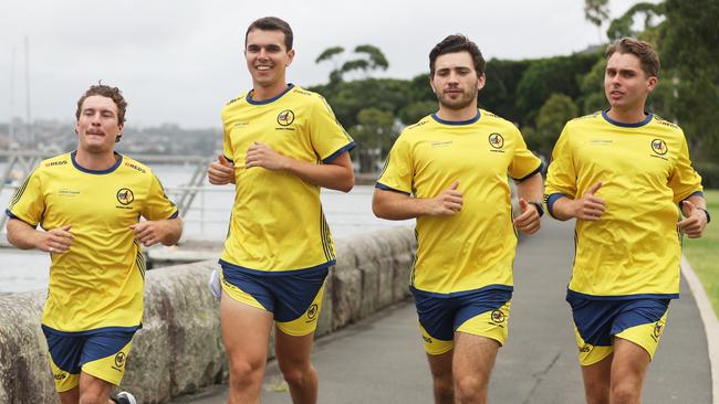 Rory Cheal, Sean Stuart, Max Cutrone and Jasper Gotterson about to leave for the USA to run in 80 marathons in 80 days. Picture: John Grainger