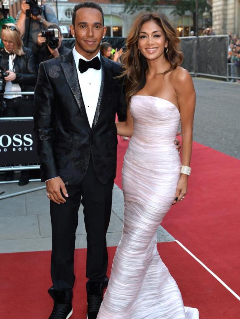 Hamilton and Nicole Scherzinger at the GQ Men of the Year awards at The Royal Opera House on September 2, 2014 in London, England. The pair split in 2015. Photo: Anthony Harvey/Getty Images