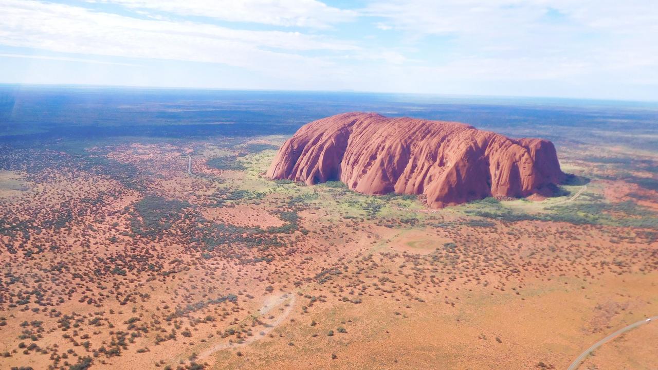 The local Aboriginal people ask people not to climb Uluru. Picture: Kimberley Caines/Ayers Rock Helicopters.