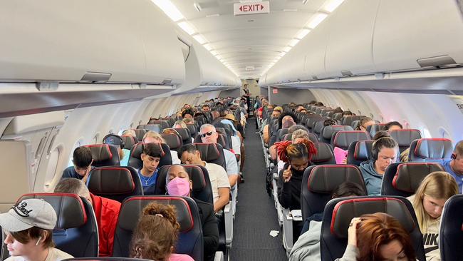 Passengers sit on board an airplane as they travel from Charlotte, North Carolina, to Washintgon, DC, this month. Picture: AFP