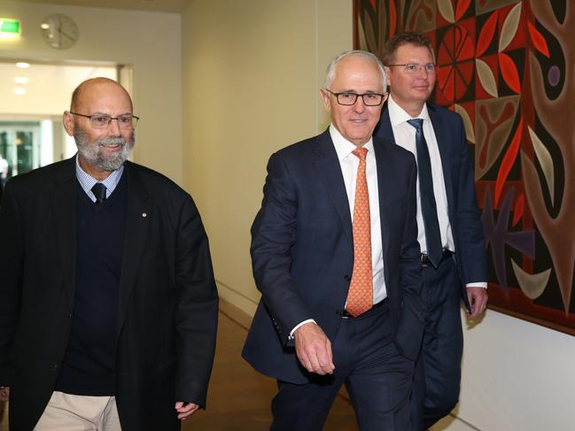 Malcolm Turnbull walking to the leadership spill with Arthur Sinodinos and Craig Laundy where he stepped down as leader, ending his career in politics. Picture: Kym Smith