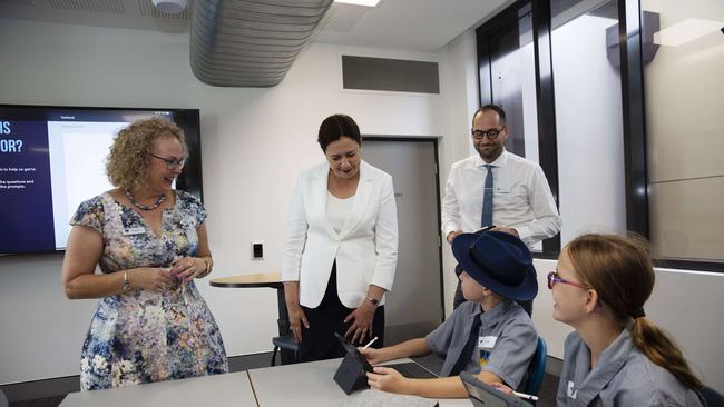 Principal Sharon Barker and Premier of Queensland Annastacia Palaszczuk with a students. First day at Fortitude Valley State Secondary College. 585 St Paul's Terrace and Brookes St, Fortitude Valley, Brisbane, 28th of January 2020. (AAP Image/Attila Csaszar)
