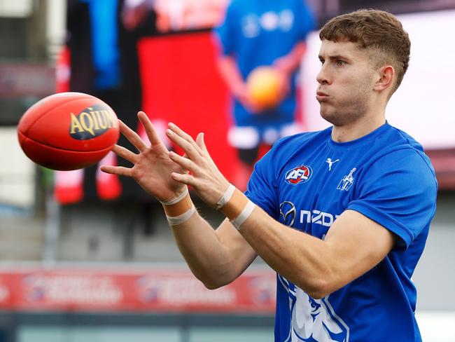 HOBART, AUSTRALIA - JULY 23: Callum Coleman-Jones of the Kangaroos warms up during the 2022 AFL Round 19 match between the North Melbourne Kangaroos and the Hawthorn Hawks at Blundstone Arena on July 23, 2022 in Hobart, Australia. (Photo by Dylan Burns/AFL Photos via Getty Images)