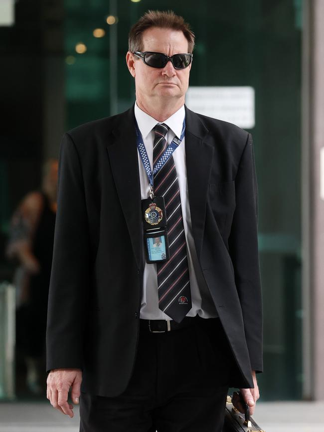 Police officer David Moore, leaving Brisbane Coroners Court during the inquest into the death of Jeffrey Brooks. Picture: Liam Kidston.