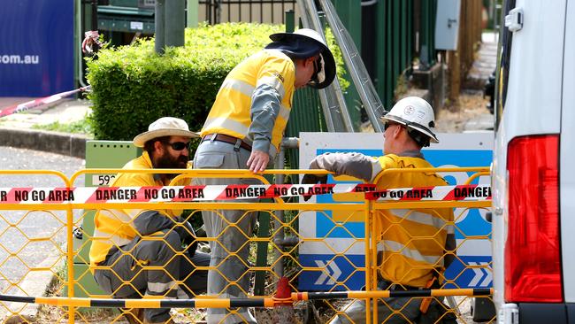 Energex workers on site at the Gabba. Picture: David Clark