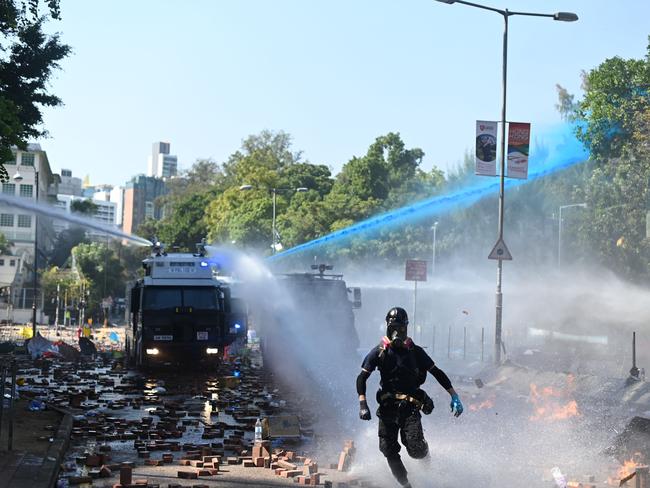 Police launched water cannons and tear gas outside the Hong Kong Polytechnic University. Picture AFP