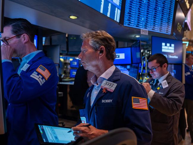 NEW YORK, NEW YORK - MAY 13: Traders work on the floor of the New York Stock Exchange (NYSE) on May 13, 2025 in New York City. Markets opened lower following the announcement that the Labor Department's Consumer Price Index (CPI) rose 0.2% on the month.   Spencer Platt/Getty Images/AFP (Photo by SPENCER PLATT / GETTY IMAGES NORTH AMERICA / Getty Images via AFP)