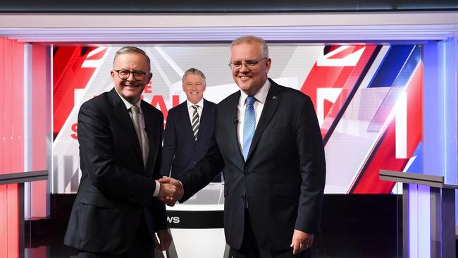 Scott Morrison and Albanese shake hands before the third leaders' debate. Picture: Getty