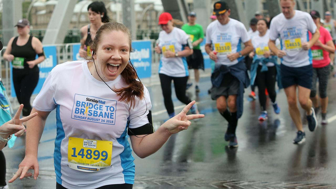 Phoebe Webber in the 10km run at the Sunday Mail Bridge to Brisbane fun Run, Sunday August 26, 2018. (AAP Image/Jono Searle)