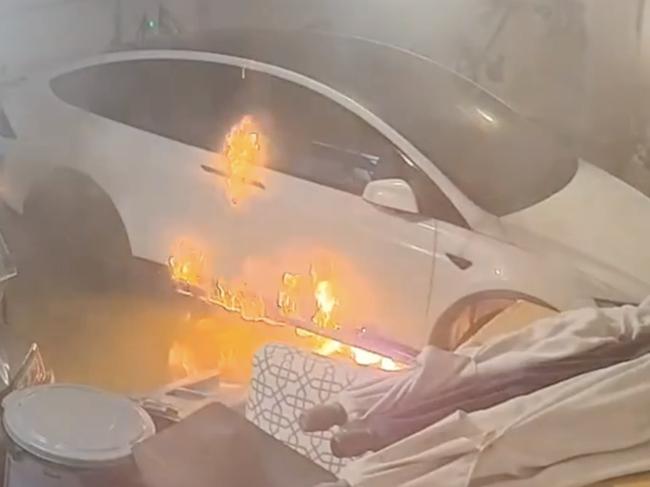 Home footage of a Tesla Model X that caught fire following a storm in the US. Photo: Supplied