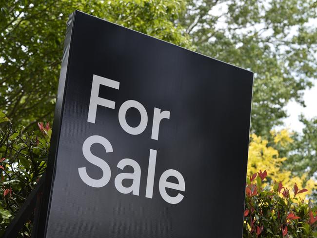 A real estate For Sale sign on a property in East Toowoomba, house for sale, Thursday, December 21, 2017.