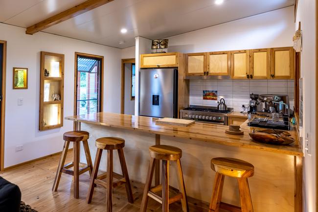 The Mount Jukes Eco Resort, built from scratch by yoga aficionado David Deakin, holds glamping tents and a half-moon shaped house that face Mt Jukes and Mr Deakin says the â€œenergyâ€ of the property has to be experienced to be understood. Picture: Contributed
