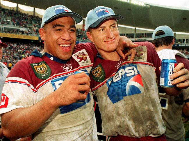 John Hopoate (L) and Steve Menzies celebrate after victory in the 1996 grand final.