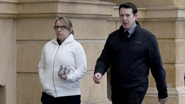 Sergeant Margie Bowden and Brevet Sergeant Andrew Smith leave the District Court after listening to Jamie Scott Dempsey apologise. Picture: NCA NewsWire / Naomi Jellicoe