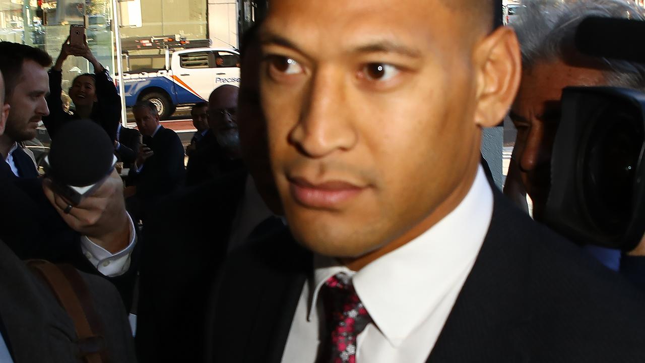 Folau making his way through the media pack. Picture: Matrix Media Group