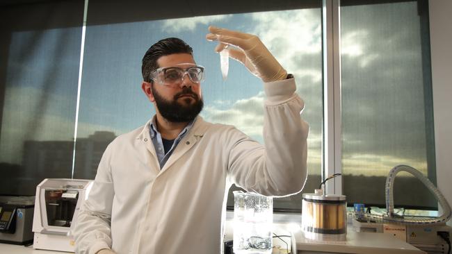 PhD student Harry Al-Wassiti from Monash University's Institute of Pharmaceutical Sciences, with live vaccine culture to be tested on COVID-19. Picture: Stuart McEvoy