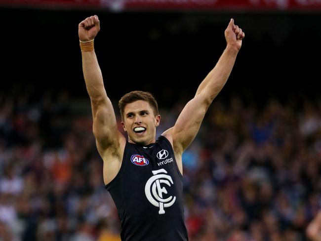 Marc Murphy celebrates after the siren of the 2013 elimination final. Picture: Colleen Petch.