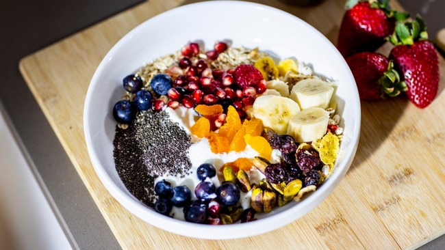 Swap sugary cereal or granola for a wholegrain option. Image: Getty