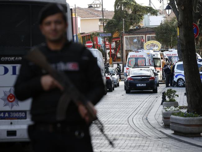 Investigation ... policemen secure the historic Sultanahmet district, as ambulances arrive. Picture: AP