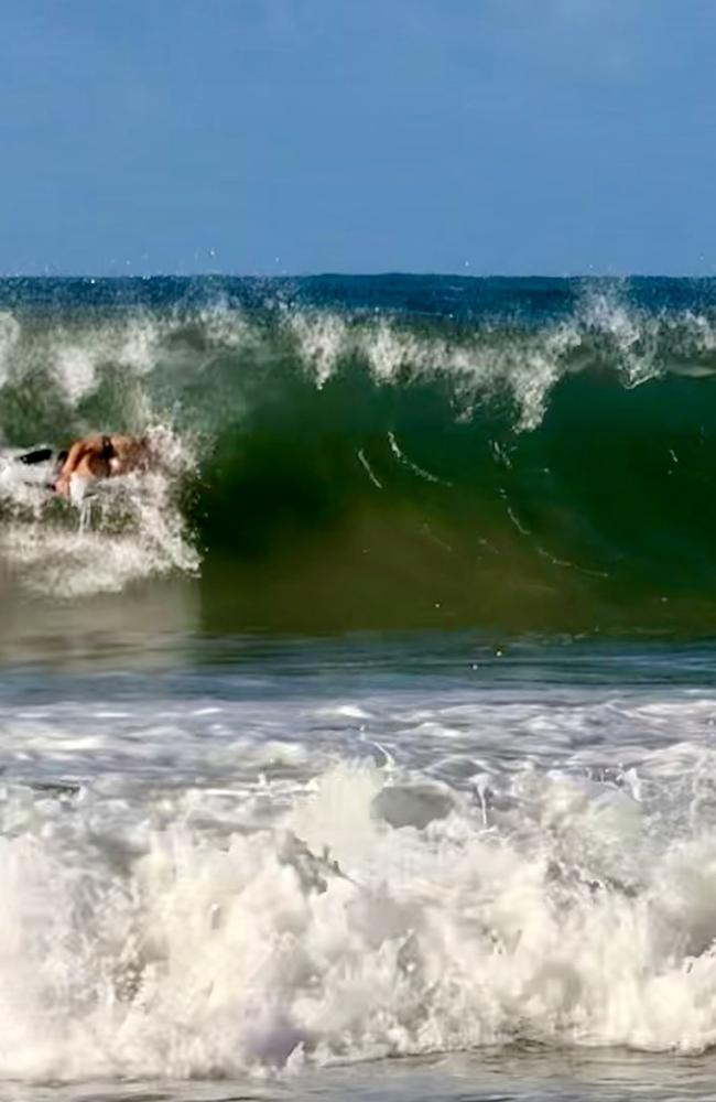 Board riders were being crunched in the big swell at Mooloolaba late Thursday afternoon as Tropical Cyclone Alfred hovered off the Qld coastline. Photo: Mark Furler