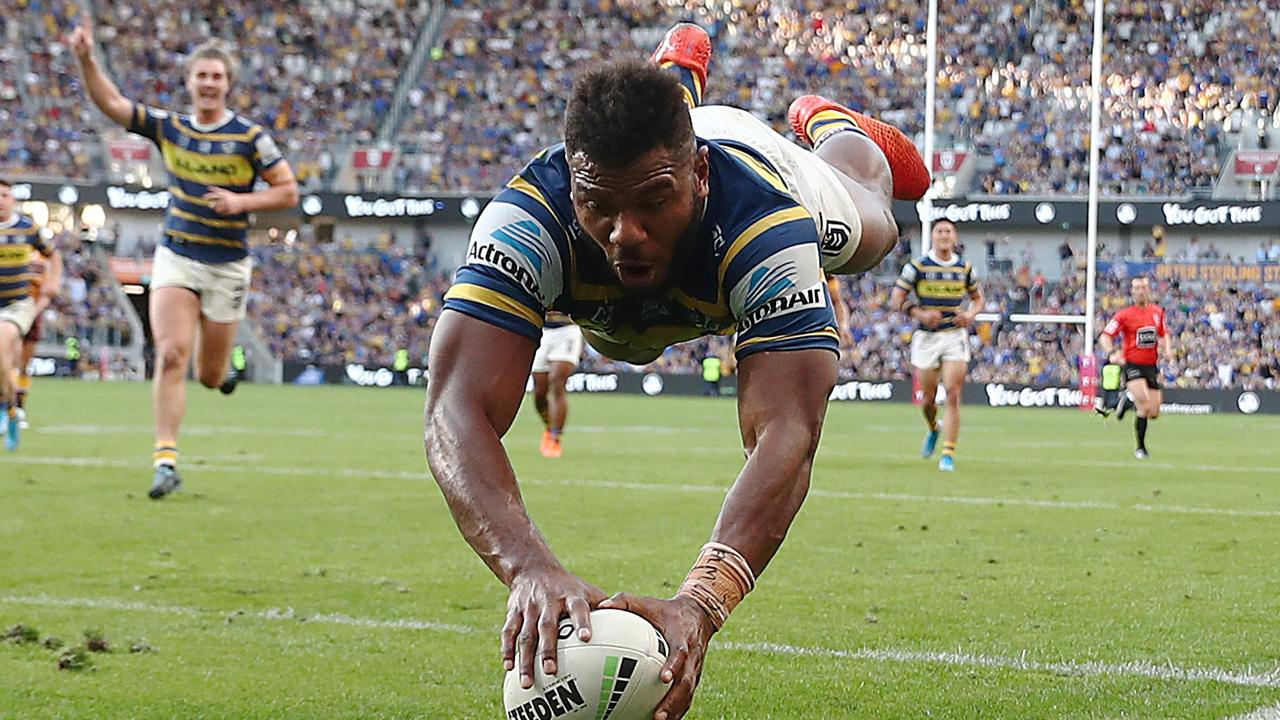 Maika Sivo crosses for an athletic try during the Eels’ romp. Picture: Mark Metcalfe/Getty Images