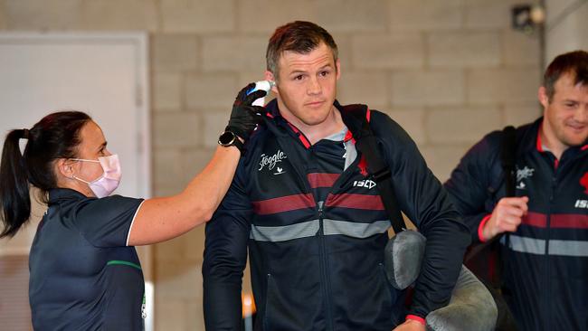 Roosters player Brett Morris is temperature tested on arrival prior to the Round 4 NRL match the Brisbane Broncos and the Sydney Roosters at Suncorp Stadium in Brisbane, Thursday, June 4, 2020. (AAP Image/Darren England) NO ARCHIVING, EDITORIAL USE ONLY