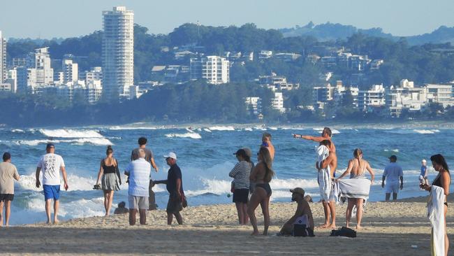 People gather to exercise on Narrowneck Beach on the Gold Coast. Picture: Lyndon Mechielsen