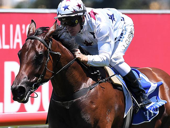 Jockey Luke Currie rides Sunlight to win race 2, the QTIS Two-Years-Old Handicap, during the Ladies Day Raceday at Aquis Park on the Gold Coast, Saturday, January 6, 2018. (AAP Image/Albert Perez) NO ARCHIVING, EDITORIAL USE ONLY