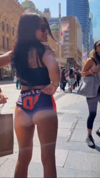 Aussie influencer's Hooters booty shorts divide