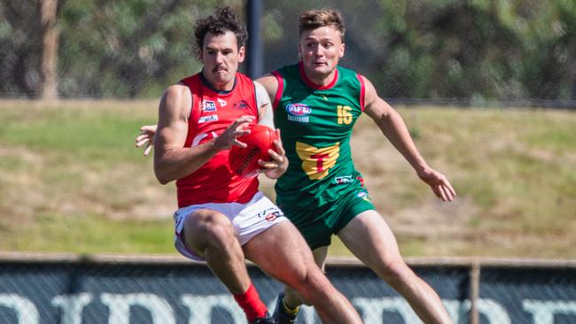 Tasmania's Riley Ashlin tries to corral his Norwood opponent. Picture: Solstice Digital