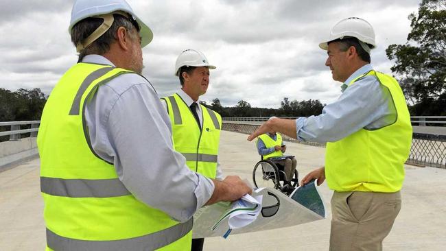 Cowper MP Luke Hartsuyker and Federal Minister for Infrastructure and Transport Darren Chester inspect the bridge over the Wilson River east of Telegraph Point.