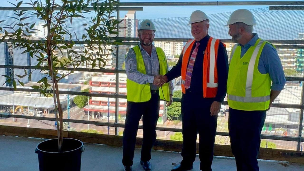 Halikos Group's managing director Shane Dignan, Professor Scott Bowman and Assistant Education Minister Senator Anthony Chisholm at the 2023 topping out ceremony.