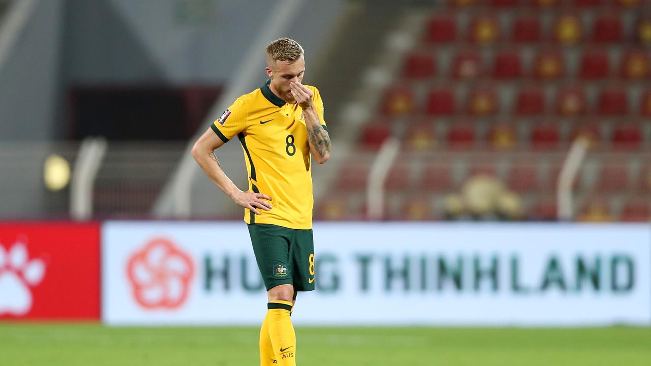 James Jeggo is dejected following Australia’s 2-2 draw with Oman. Picture: Adil Al Naimi/Getty Images