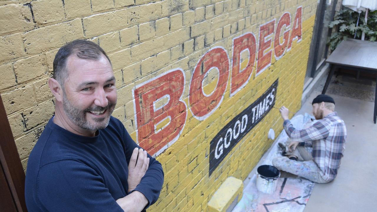 Todd Farr is getting ready to launch his new live music bar Bodega at Walton Stores, with the artwork outside the venue now completed by sign-writer Rick Wayward.