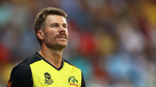 David Warner of Australia looks on during the ICC Men's T20 World Cup match between Australia and England at Dubai International Stadium on October 30, 2021 in Dubai, United Arab Emirates. (Photo by Francois Nel/Getty Images)