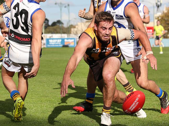 VFL: Box Hill v Sandringham.Box Hill's Mitchell O'Donnell closes on the ball as Sandringham's Jordan Matera and Jack Lonie apply pressure.Picture : Ian Currie