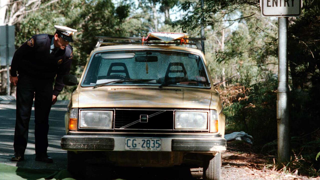 Bryant’s car with surfboard on roof at Port Arthur toll gates